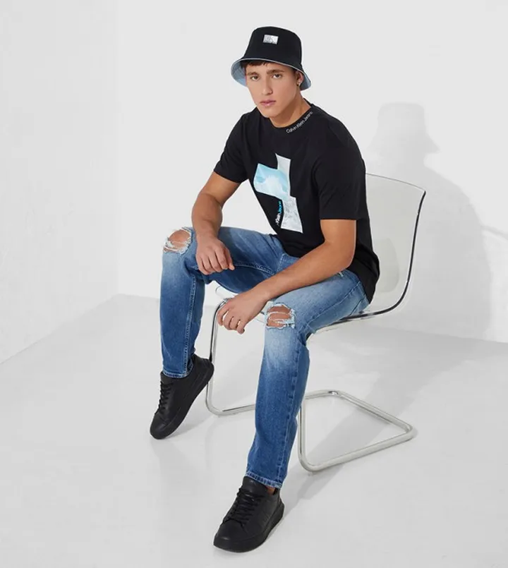 Mid Rise Tapered Jeans