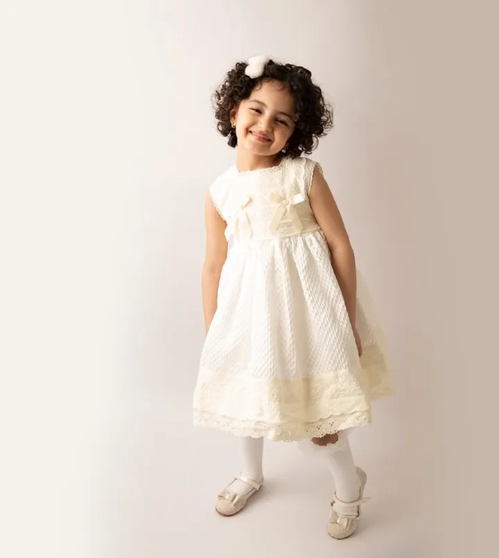 Knitted Dress With Lace and Bow Details