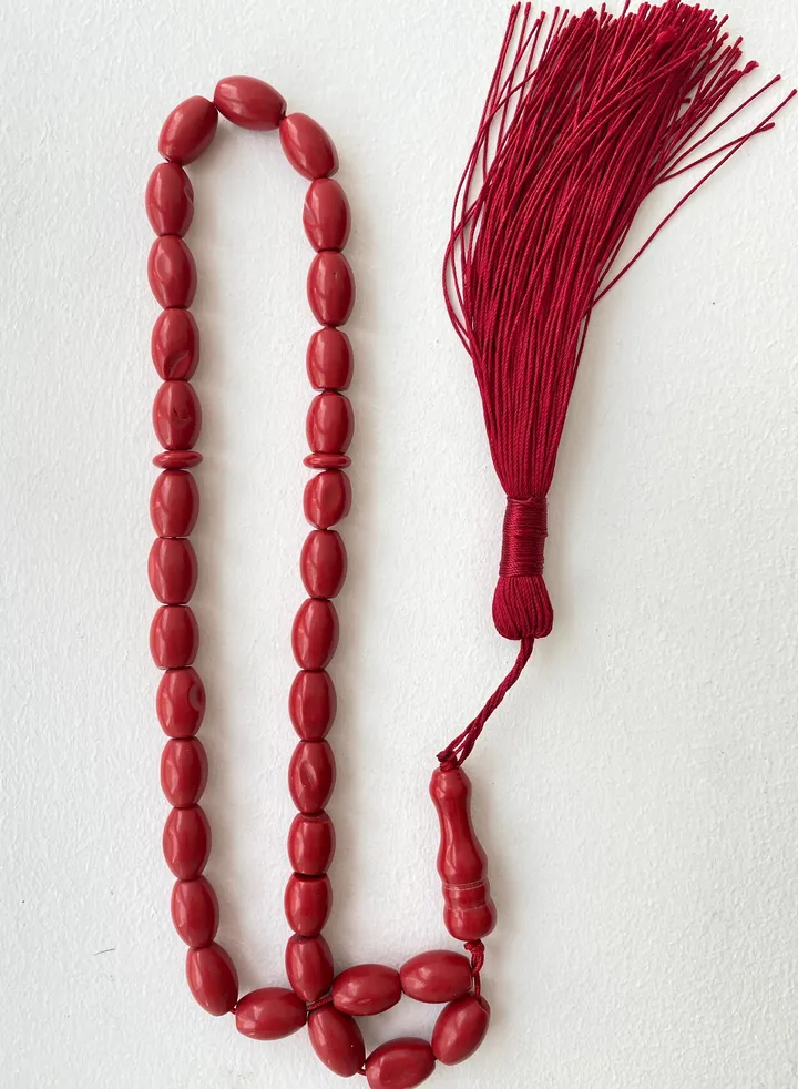 red prayer beads rosary