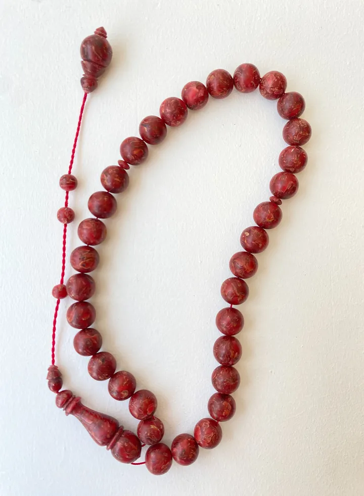 A rosary of roses with a scent