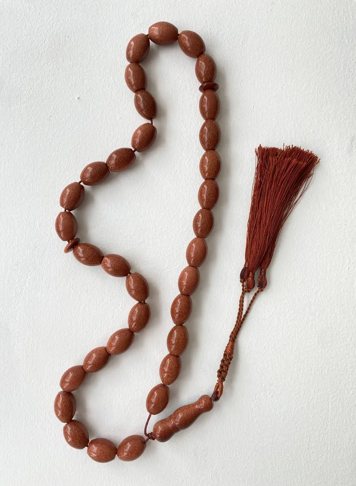 prayer beads brown sand stone