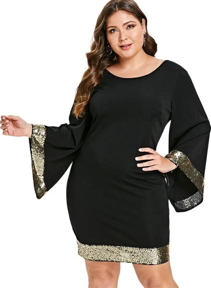 Black evening dress with embroidered sleeves