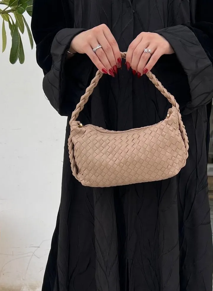 Twisted handbag