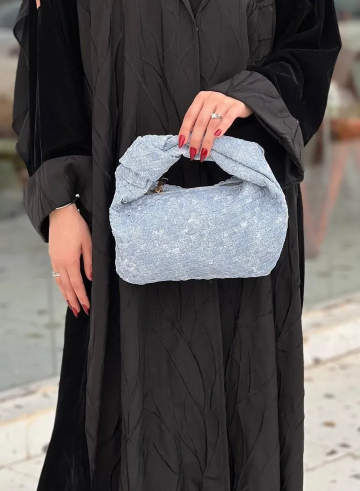 Twisted jeans handbag