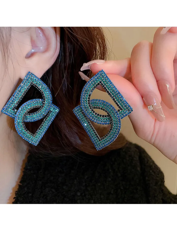 blue earrings with zigzag diamonds