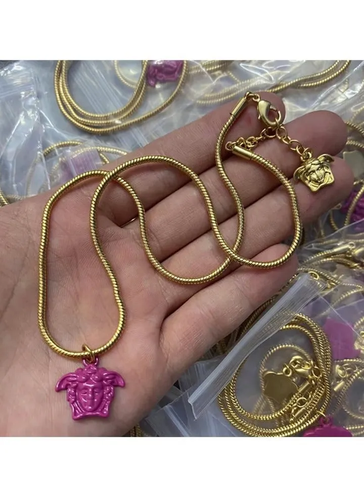Versace Men's and Women's Classic Pink MEDUSA Pendant with Gold Snake Bone Necklace