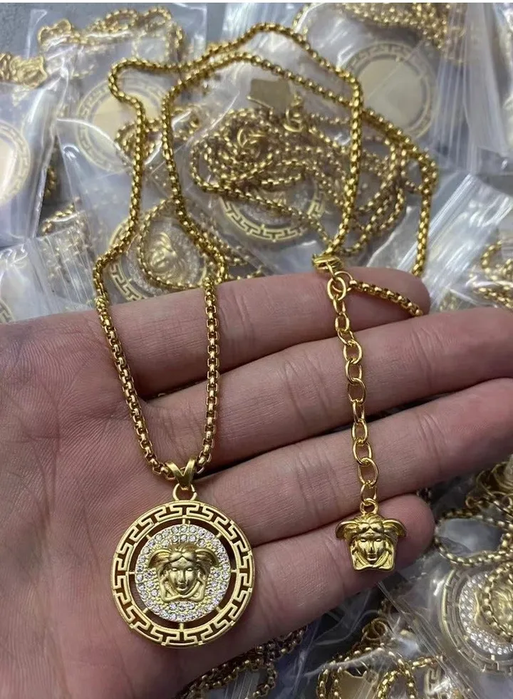 Versace Men's and Women's Cubic Zirconia Classic MEDUSA Round Hollowing Out Pendant with Gold Necklace