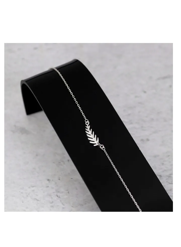 Unique silver women's bracelet with leaf pendant design