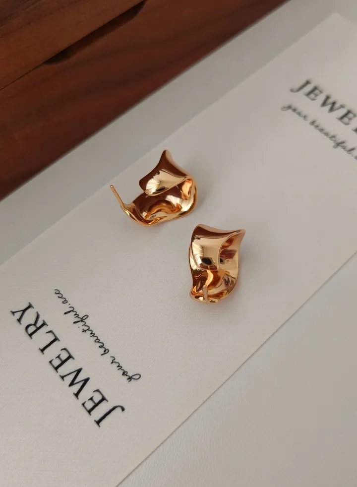 18-karat gold earrings in sterling silver