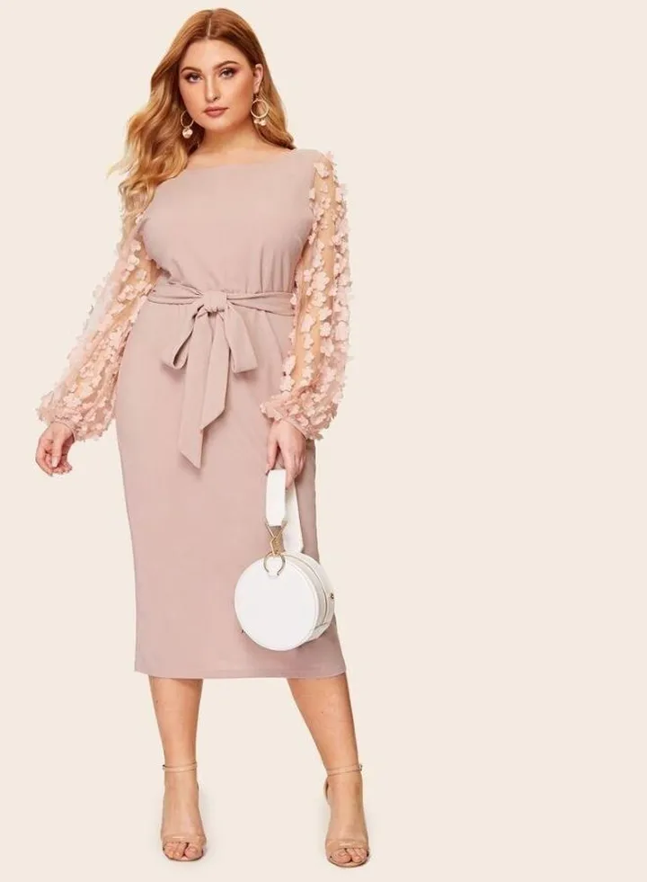Very chic evening dress with mesh sleeves