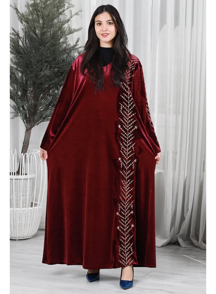 Red velvet galabiya decorated with gold embroidery