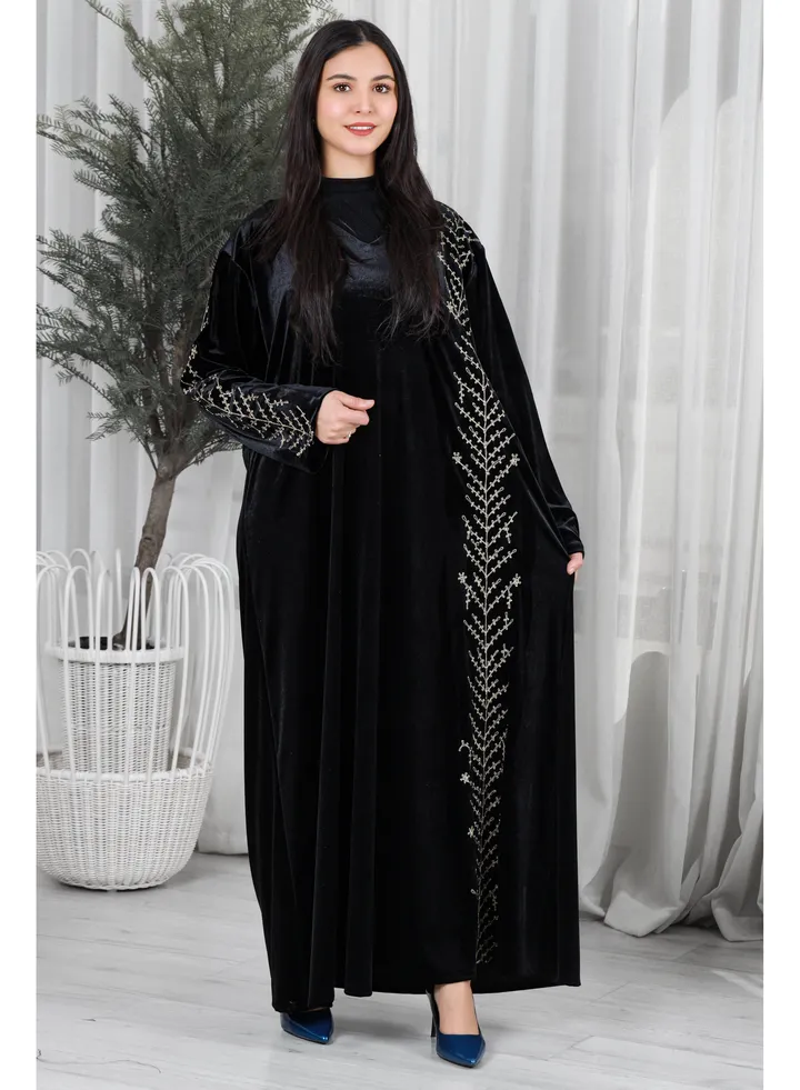 Black velvet galabiya decorated with gold embroidery