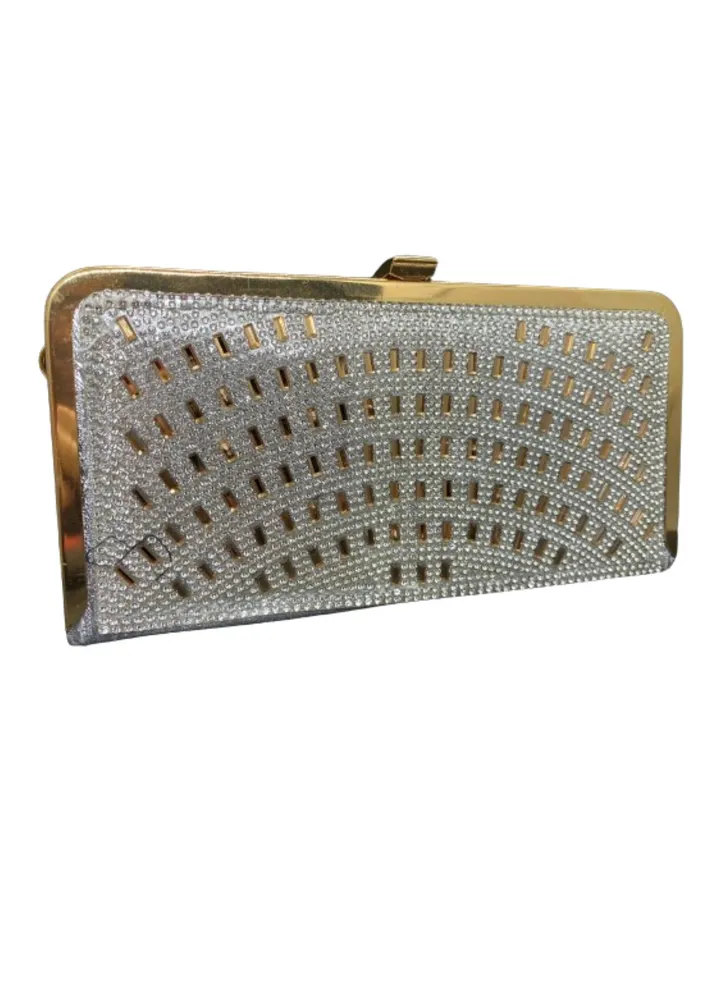 A luxurious women's bracelet bag, gold and silver, decorated with a golden metal arm