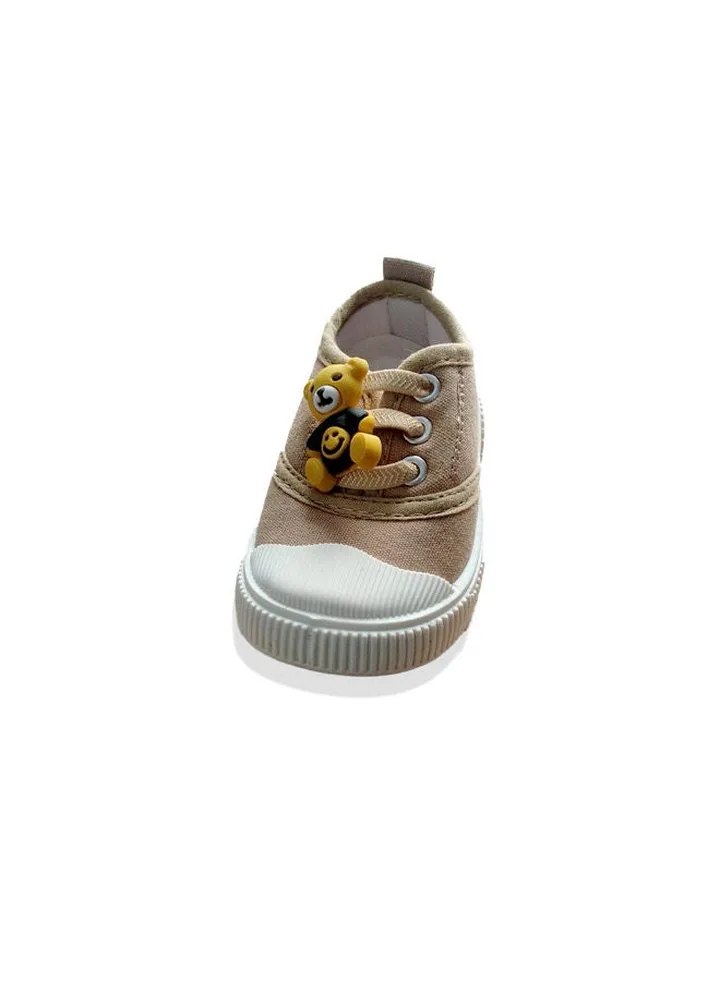 Kids shoes with bear decorations