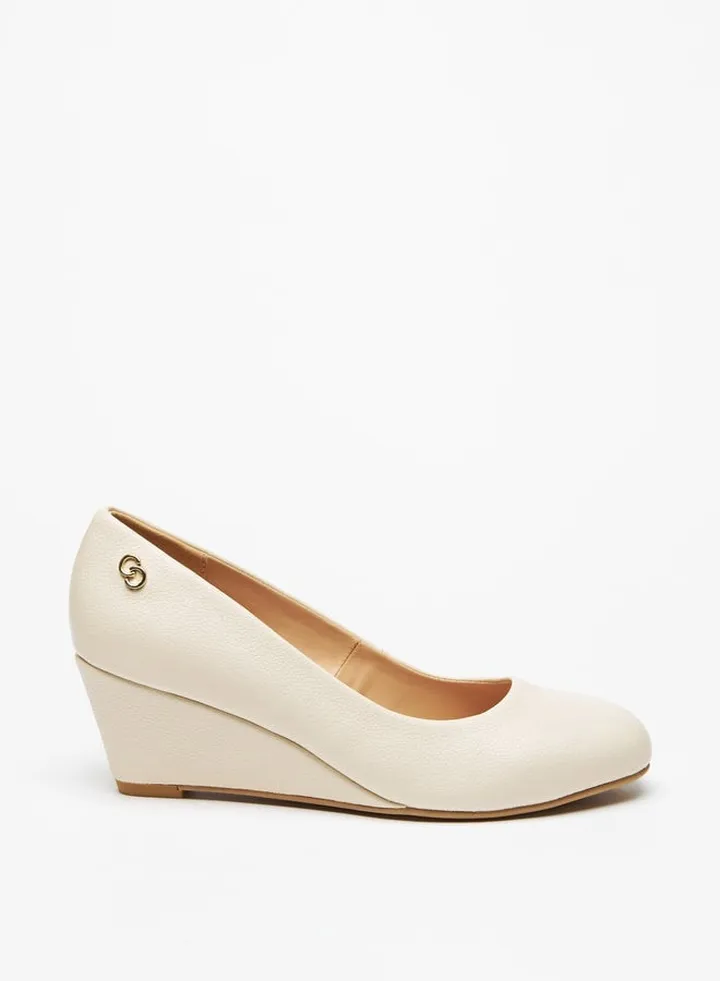 Women Solid Wedge Heeled Pumps