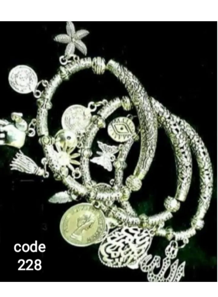 A set of women's and girls' bracelets of nickel silver with multiple pendants