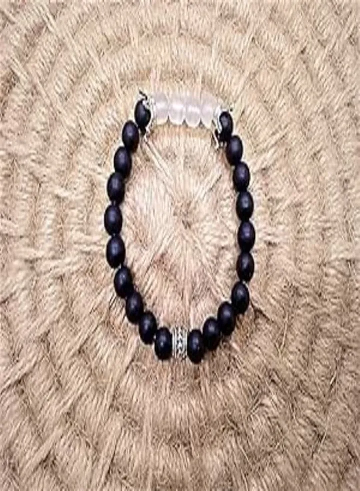 A unisex bracelet of black beads