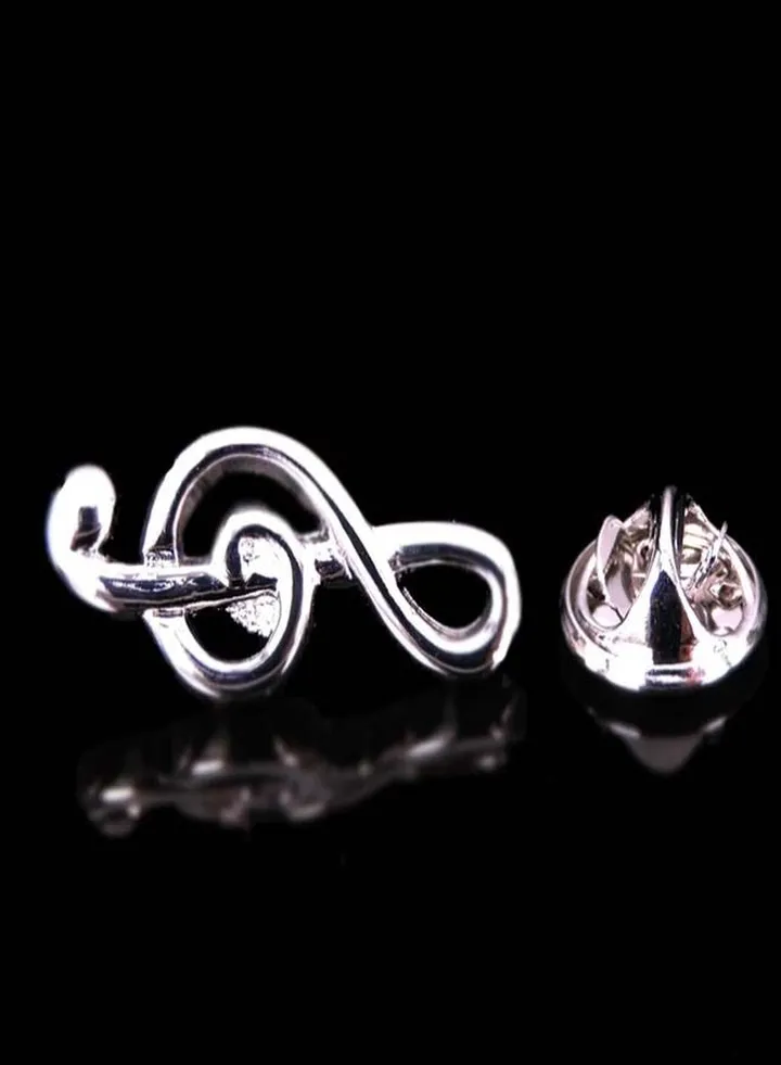 An accessory pin for a suit or shirt