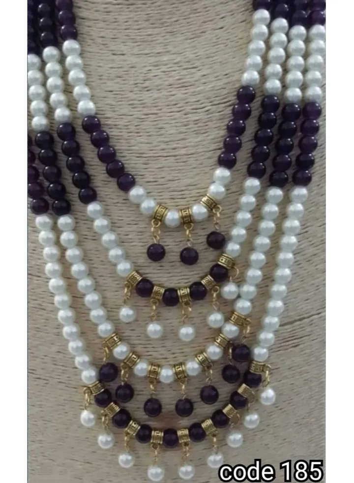 Multi-layered women's necklace made of white and black Mallorcan wali