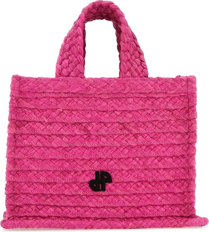 Handbag realized in woven straw enriched by JP patches at the front and at the back.