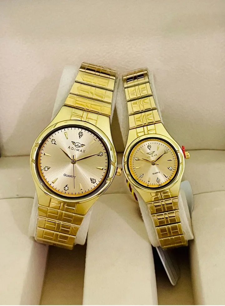 couple watches 2 pcs for men and women gold plate pawnable waterproof guarantee 100% with beautiful box