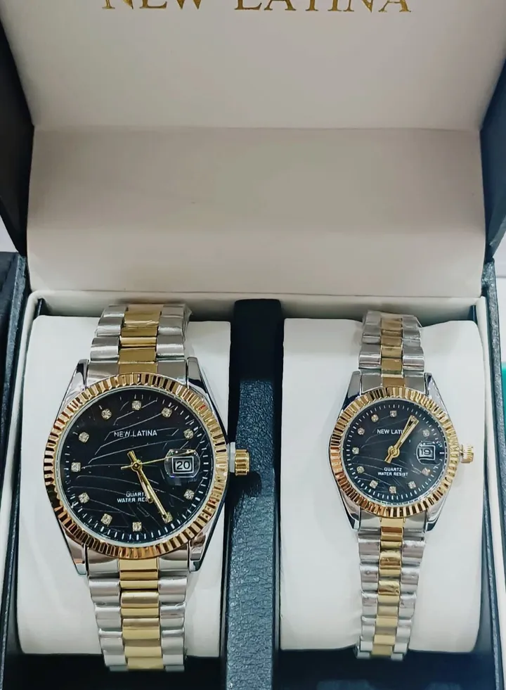 Two Rolex-style watches with stainless steel hands and bracelet