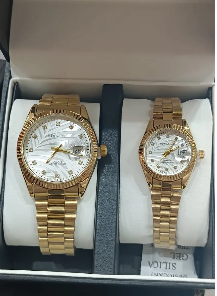 Two Rolex-style watches with stainless steel hands and bracelet