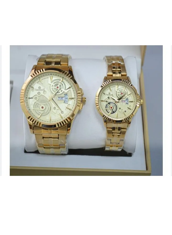 A unisex watch set made of stainless steel, water resistant, scratch resistant and shock absorbent.