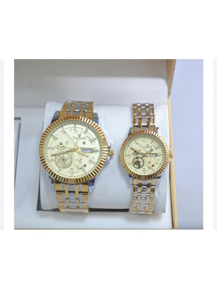 A unisex watch set made of stainless steel, water resistant, scratch resistant and shock absorbent.