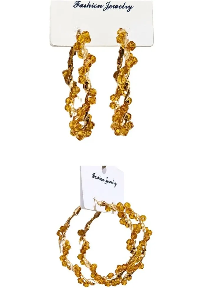 Circular gold tone earrings
