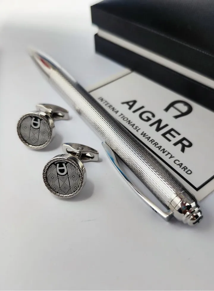 A set of Aigner pen and cuff