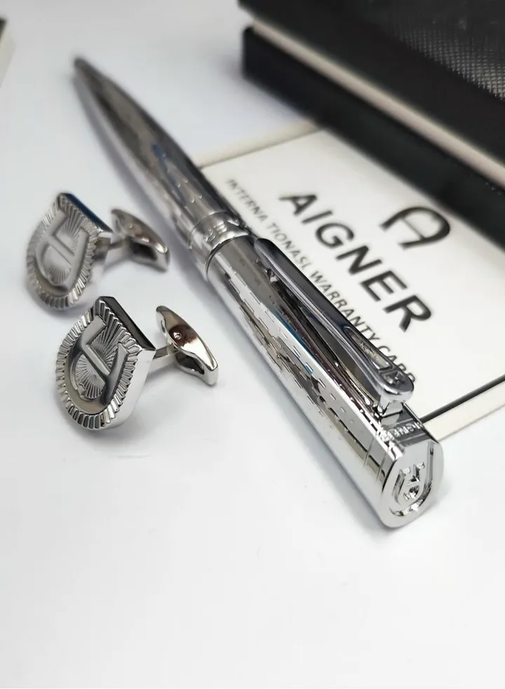 A set of Aigner pen and cuff