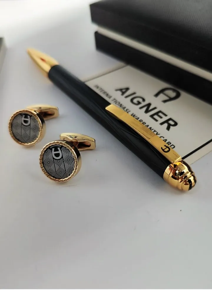 A set of Aigner pen and cuff