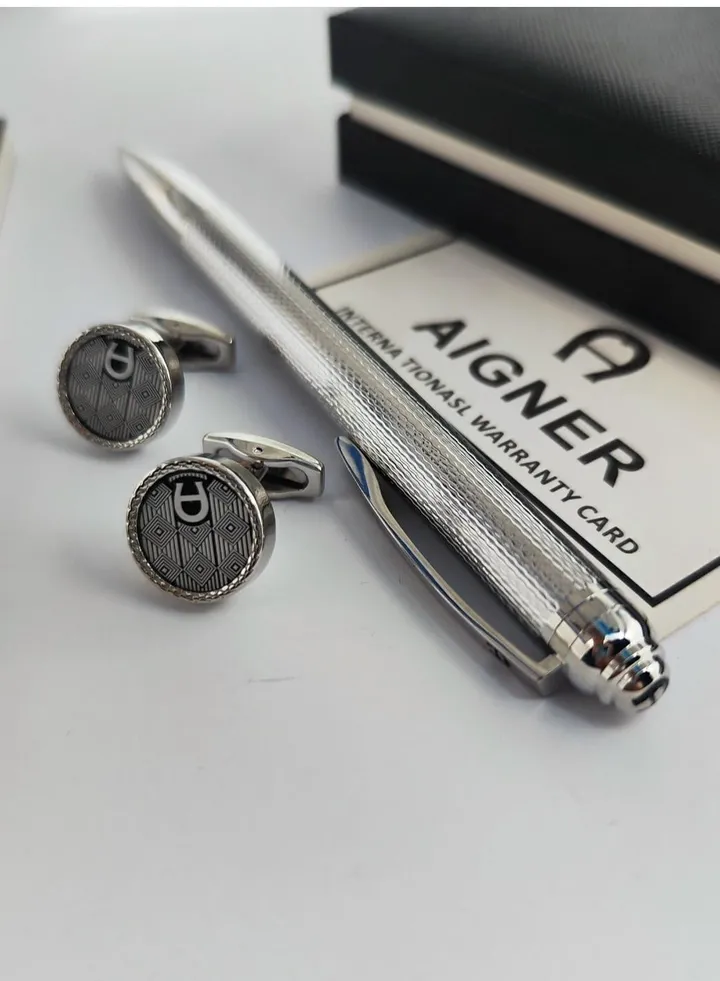 A set of Aigner pen and cuff