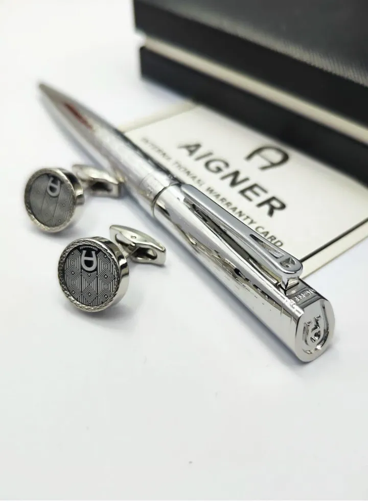 A set of Aigner pen and cuff