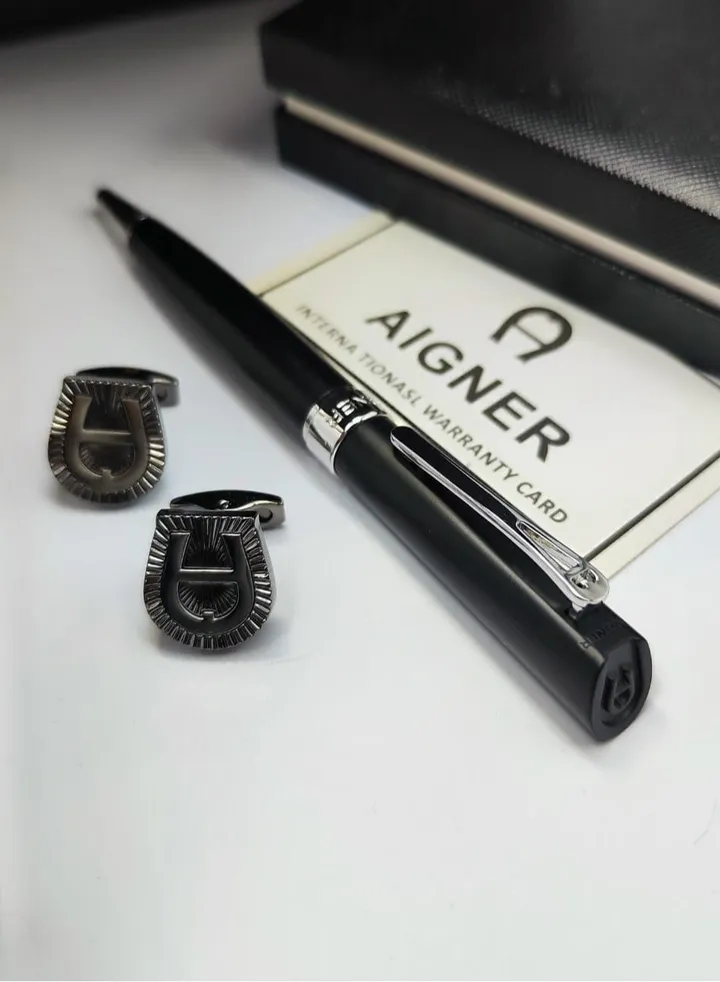 A set of Aigner pen and cuff