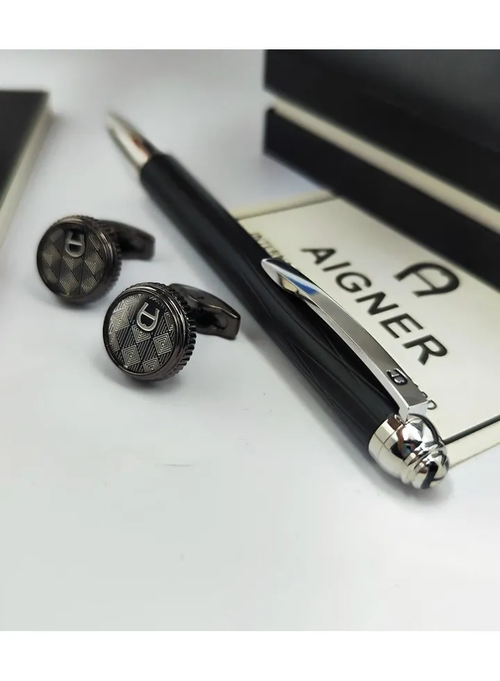 A set of Aigner pen and cuff
