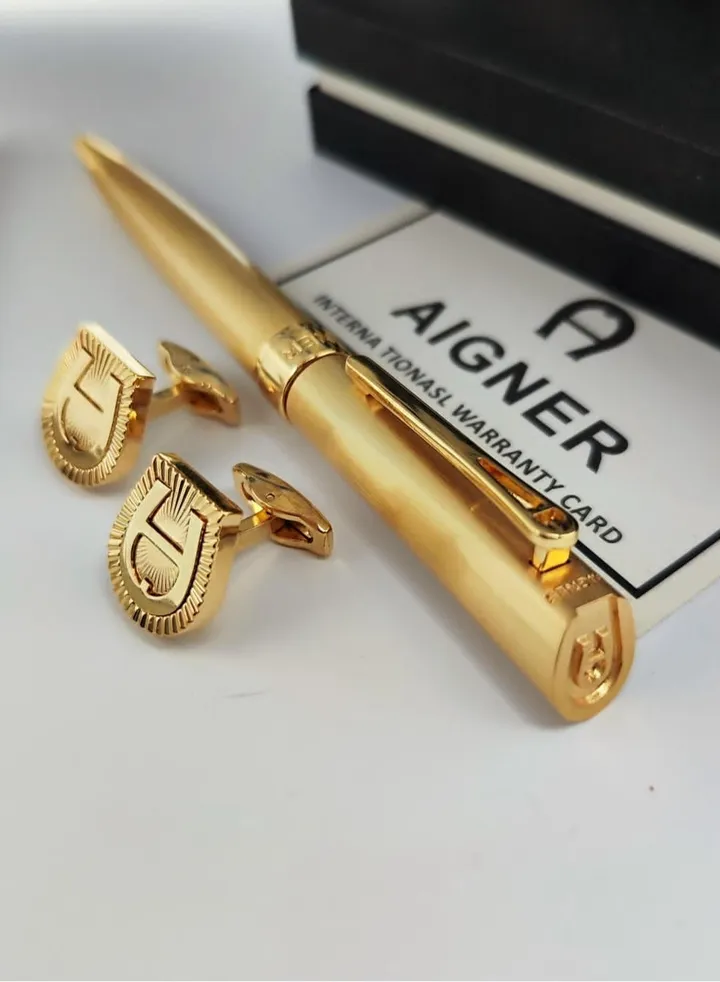 A set of Aigner pen and cuff