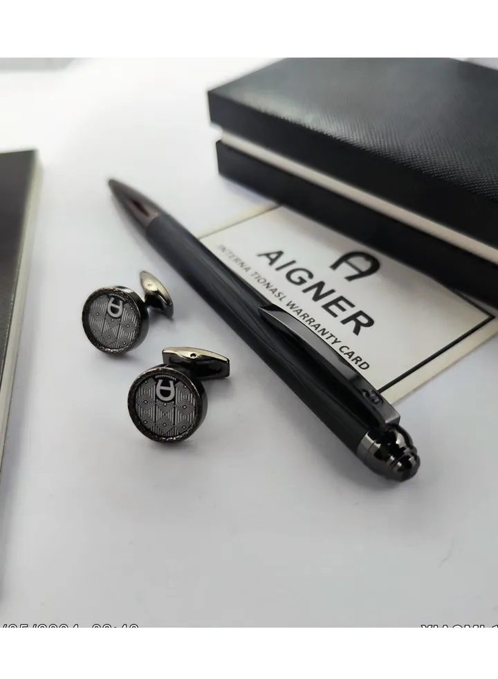 A set of Aigner pen and cuff