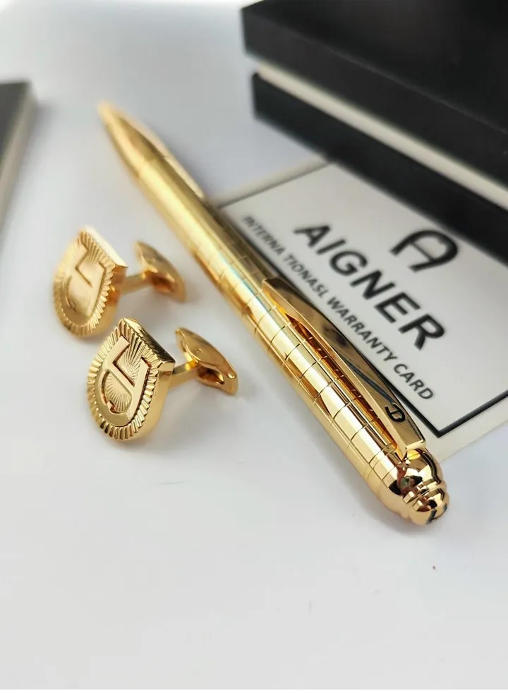 A set of Aigner pen and cuff
