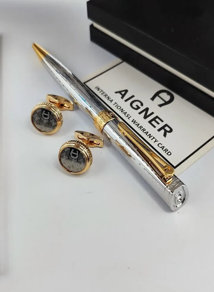 A set of Aigner pen and cuff