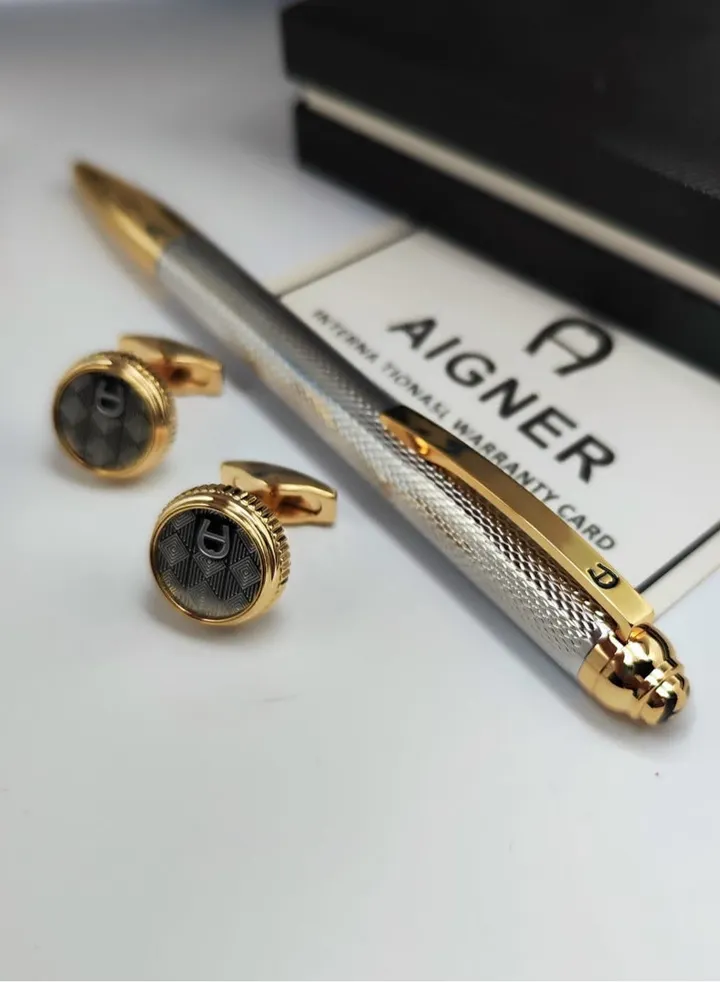 A set of Aigner pen and cuff