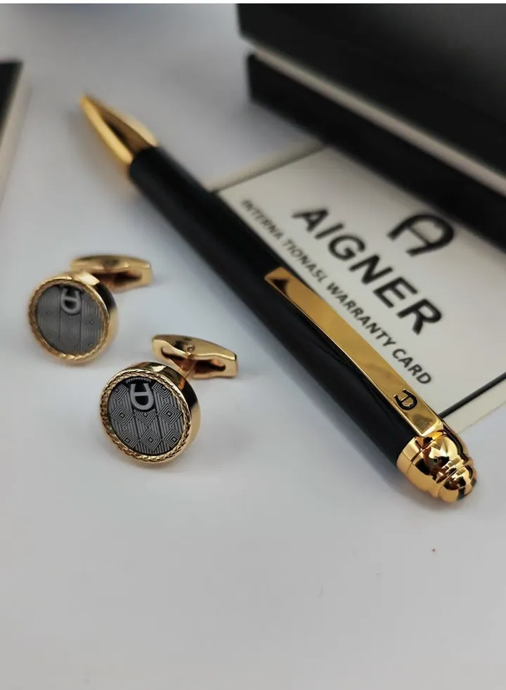 A set of Aigner pen and cuff