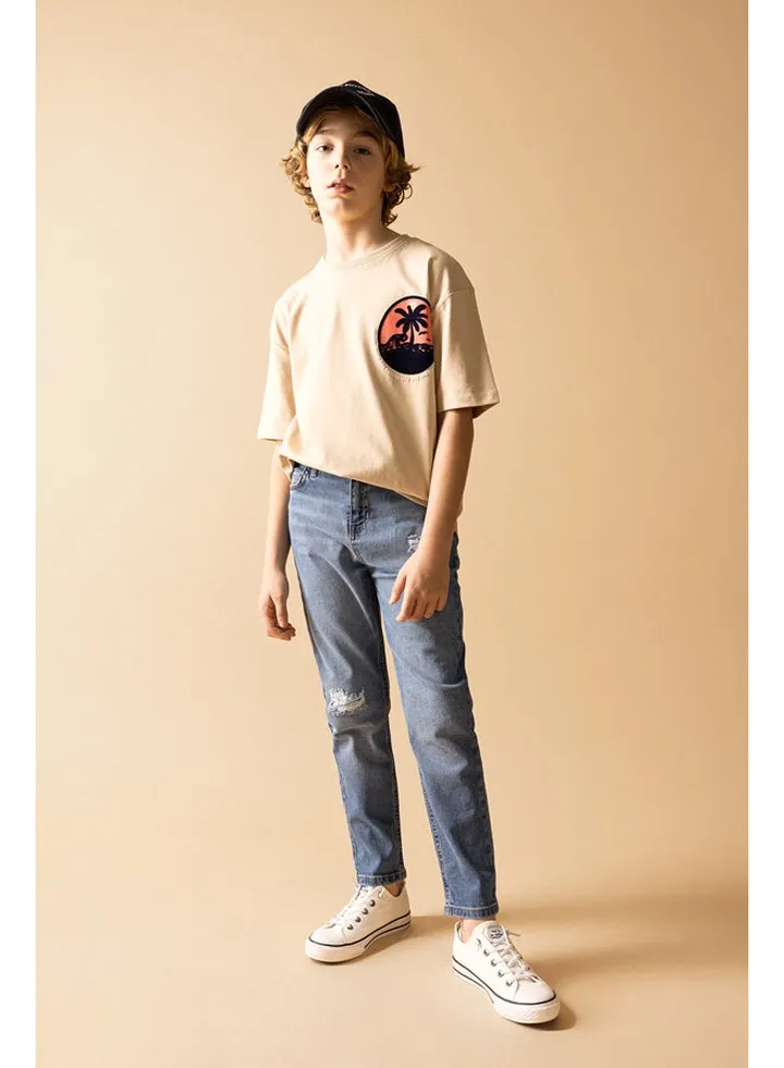 Boy Carrot Fit Denim Trousers
