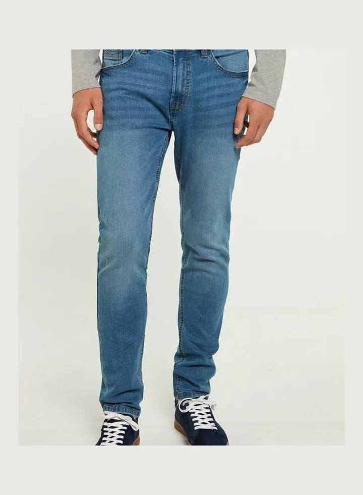 Medium wash slim fit lightweight jeans