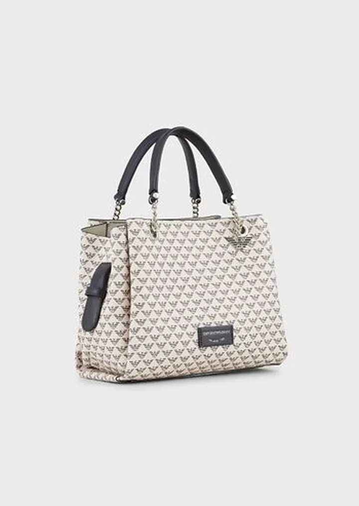 All-over eagle handbag with eagle charm