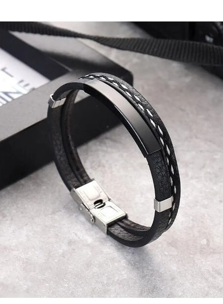Black natural leather bracelet decorated with black steel pieces