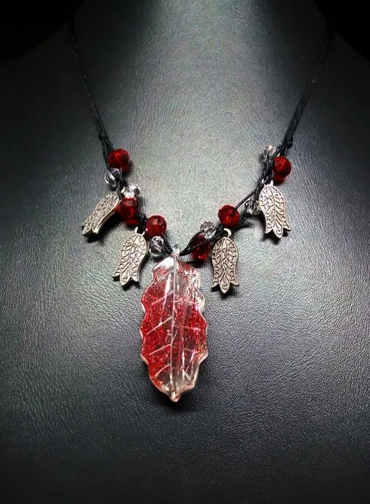 Red Resin Pendant Decorated With Silver Roses