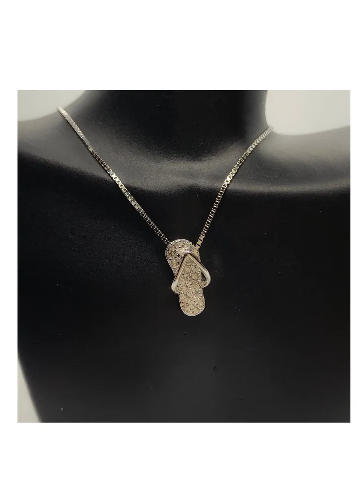 A Unique Silver women's necklace with a shoe-shaped pendant design