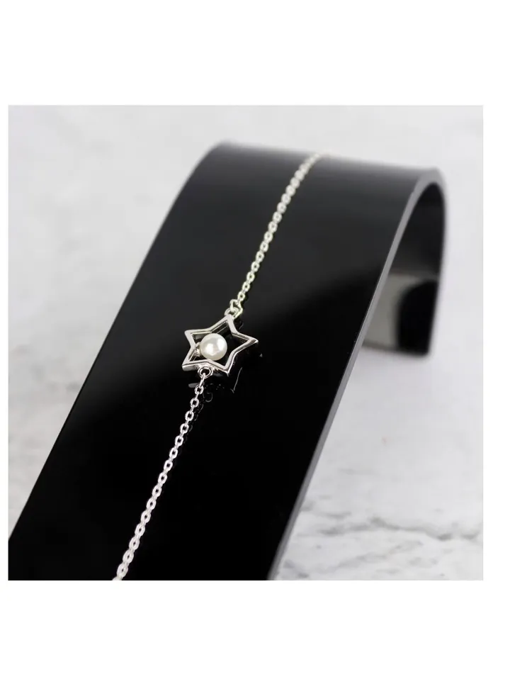 Unique silver women's bracelet with star pendant design